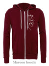 Frontliners: White with customized "MD" on a maroon hoodie