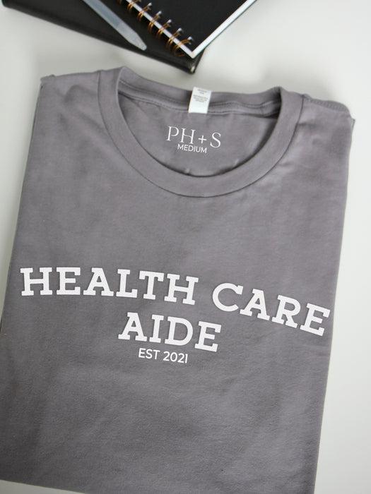 Collegiate: Health Care Aide on Storm long sleeve