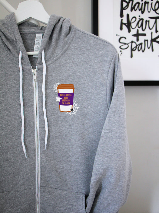 Hocus Pocus Caffeine on a Athletic Grey zip up hoodie