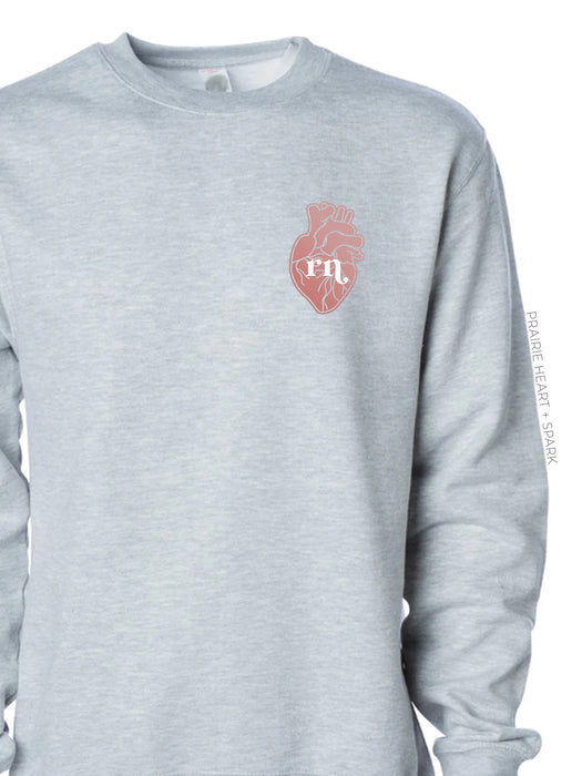 HEART-ology: Rose Gold heart with RN creds on Athletic Grey sweatshirt