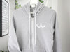 White 'Breast Cancer ribbon' on a Athletic Grey hoodie